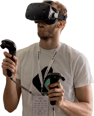 Guy playing with a VR headset.